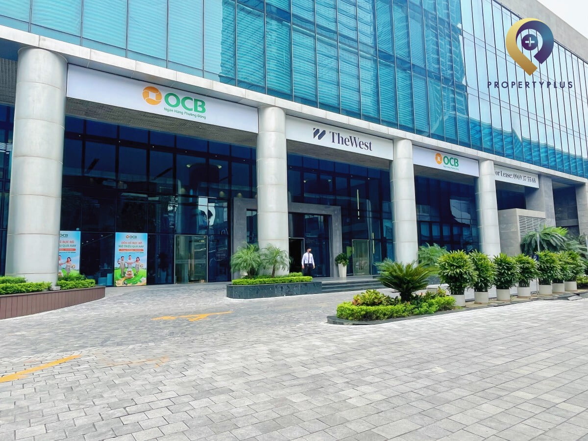 Reception area with OCB bank counter inside The-West building do Property Plus giới thiệu